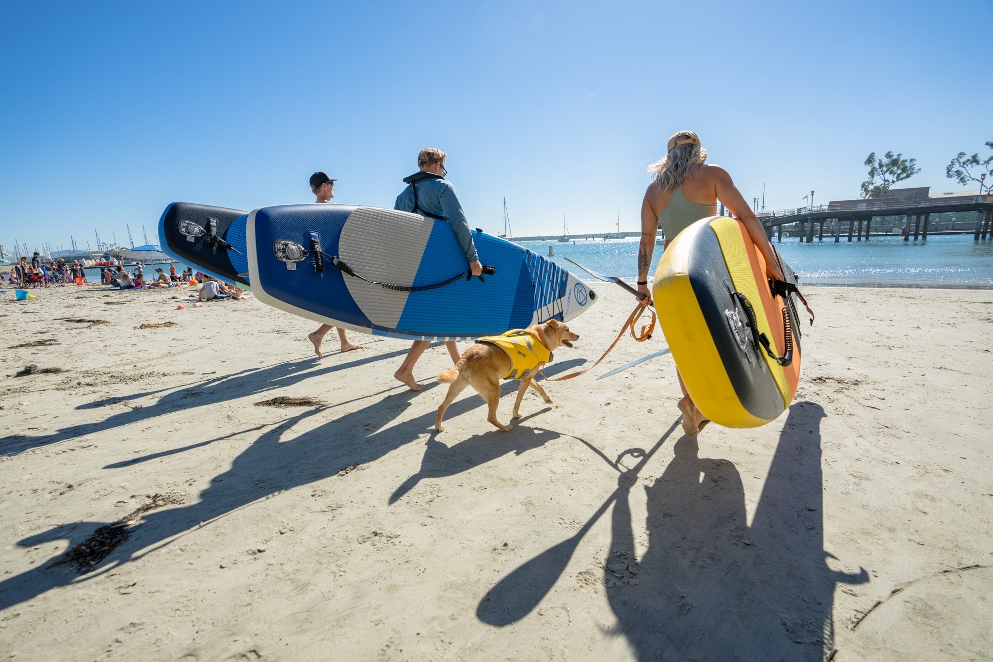 A group of people is about to paddleboarding with Jimmy Styks ISUPs2
