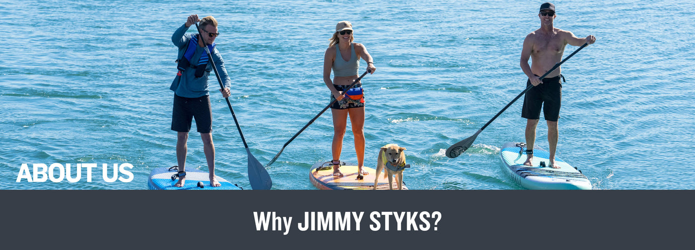 A group of friends are paddle boarding with Jimmy Styks Inflatable SUPs