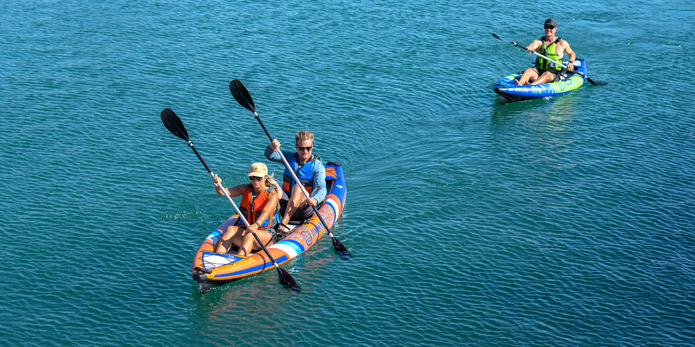 people are kayaking with inflatable kayak