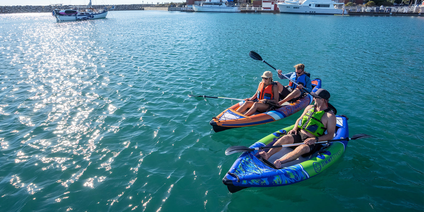 People are kayaking with inflatable kayak
