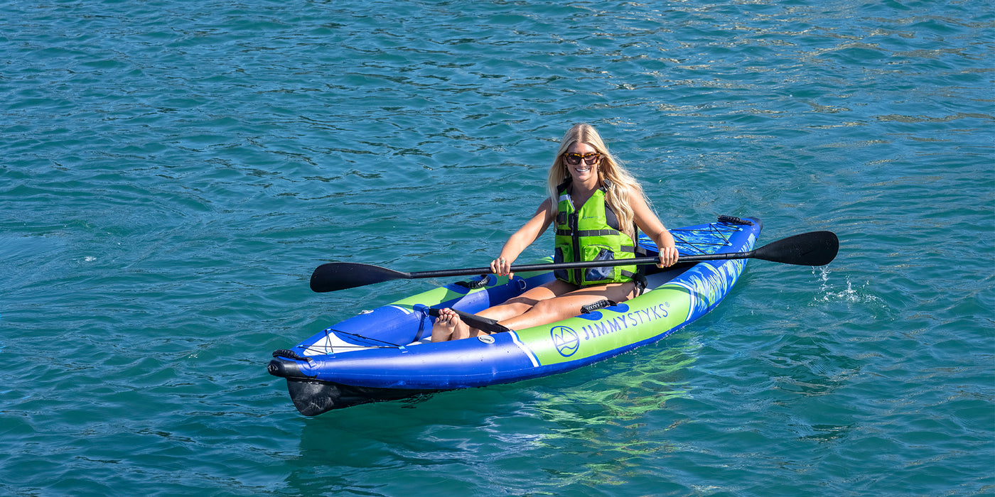 a woman is kayking with Jimmy Styks Inflatable Kayak