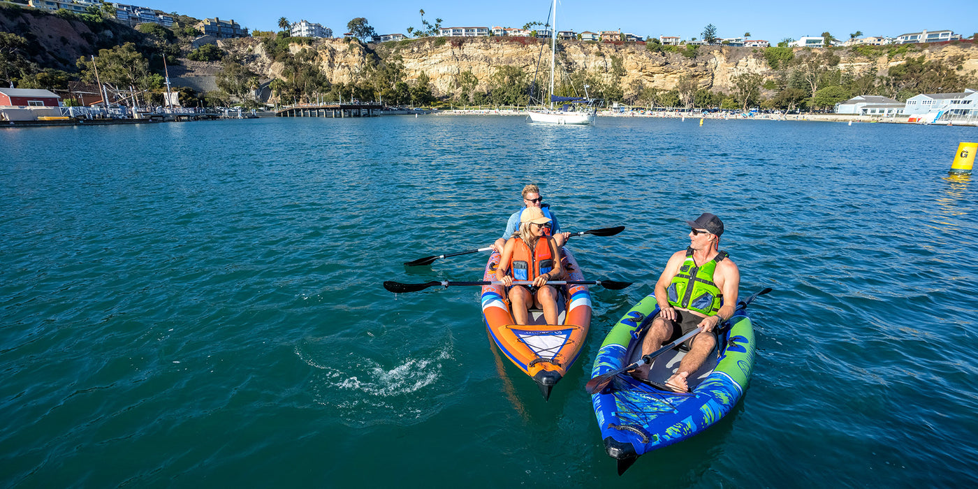 a man and a woman is kayking with Jimmy Styks inflatable kayak 2 person, whilst a man is kayaking with inflatable kayak 1 person