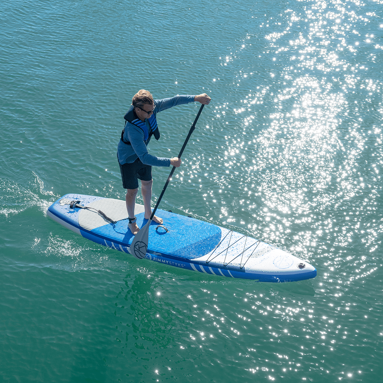 A man is paddling with Jimmy Styks Strider (mobile version)